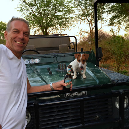 Ben proud of his Landrovers (and dog)
